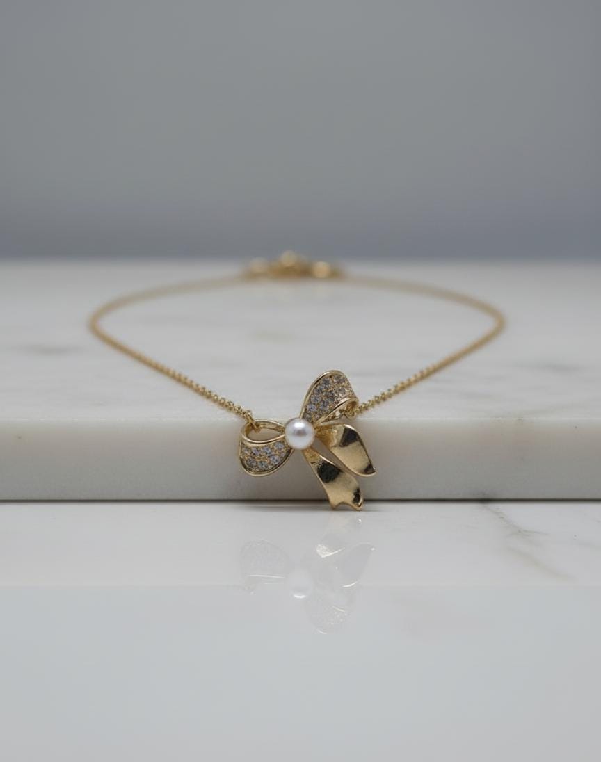 Radiant Bow Pearl and Diamond Necklace