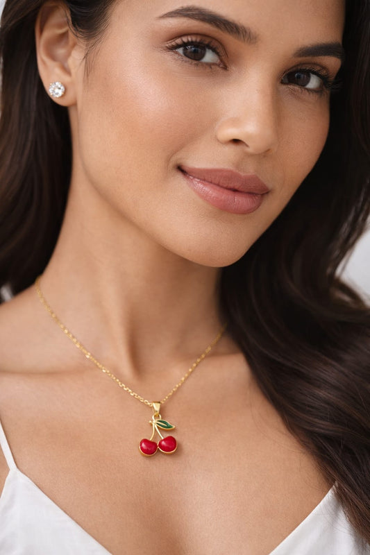 Gold-Toned Cherry Pendant Necklace & Crystal Stud Earrings Combo