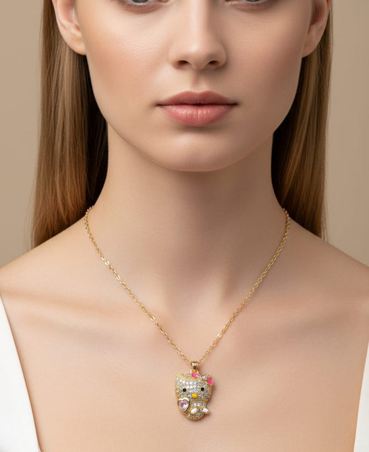 Close-up of a necklace with a colorful pendant on a model against a neutral background