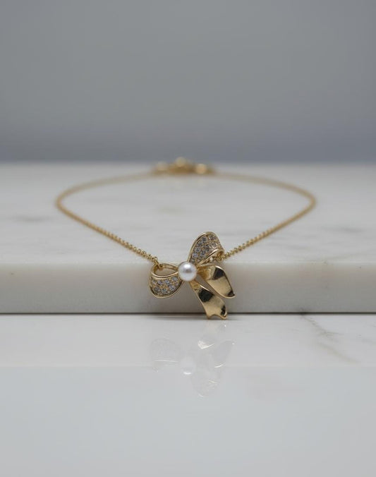 Radiant Bow Pearl and Diamond Necklace