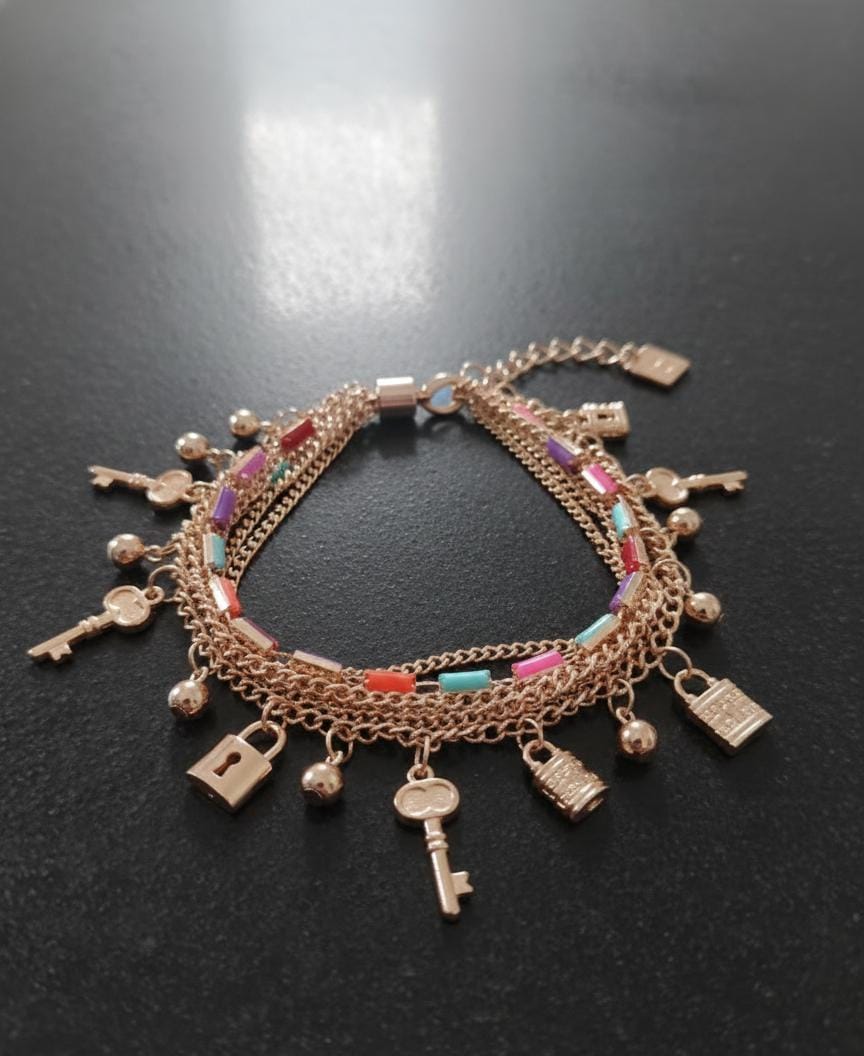 Golden Lock & Key Charm Bracelet