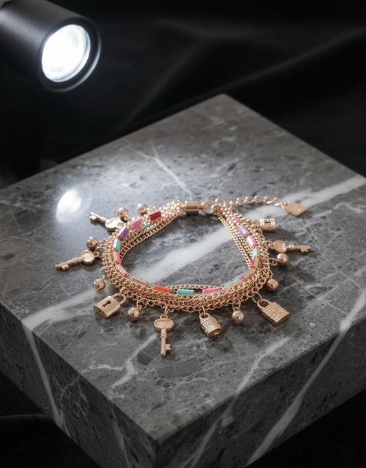 Golden Lock & Key Charm Bracelet