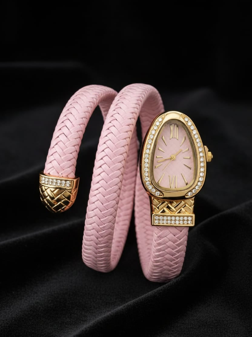 Pink braided watch with gold accents on a black background