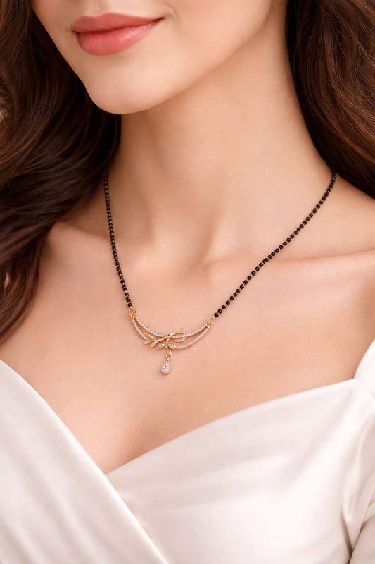 Gold Plated CZ Leaf Designer Mangalsutra with Black Beads & Teardrop Pendant